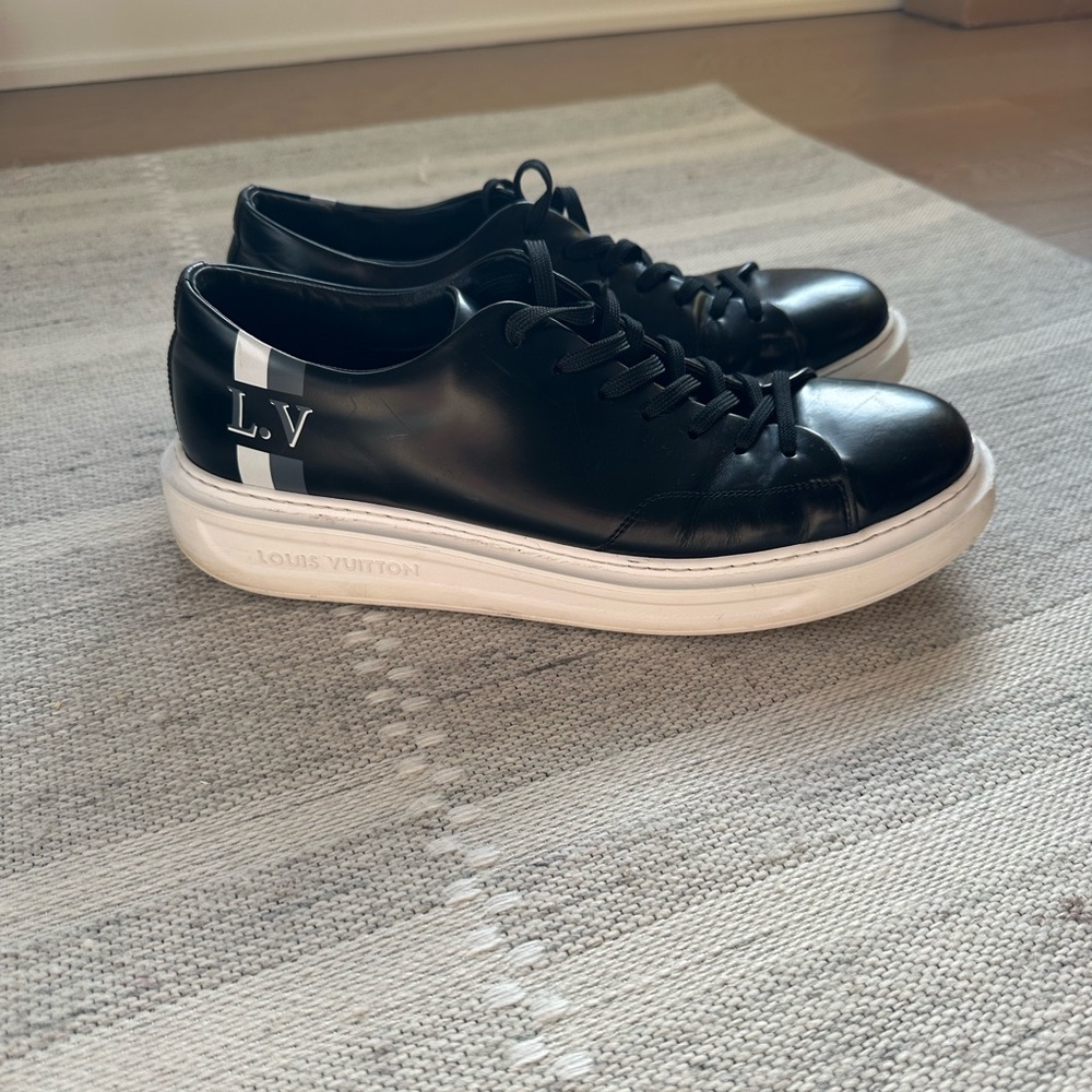 Louis Vuitton Black and White Sneakers with Leather Upper and Thick Sole